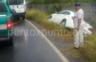 SALE DE CARRETERA EN CURVA PROLONGADA EN SANTIAGO.