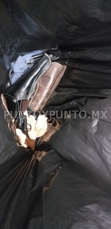 DEJAN ABANDONADAS ARMAS DE FUEGO EN BAÑO DE MUJERES EN SUPER MERCADO EN SANTIAGO.