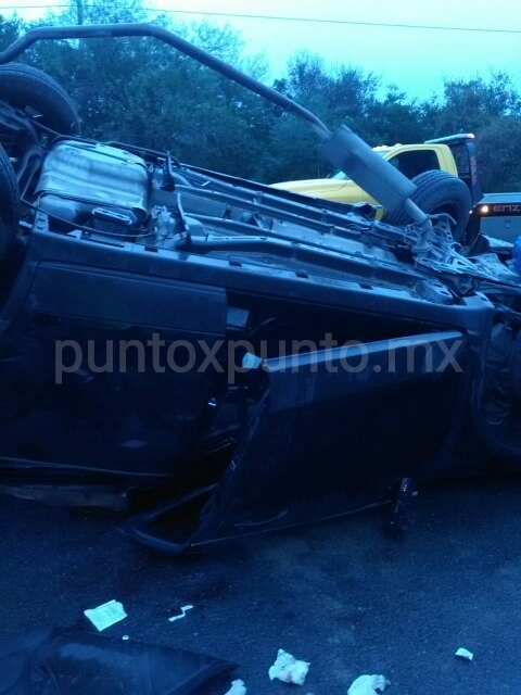 PERSONAS HERIDAS EN CHOQUE TIPO VOLCADURA EN CARRETERA NACIONAL.