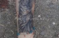 MUJER EJECUTADA CONTABA CON TATUAJE DE UNA MUERTE EN SU BRAZO IZQUIERDO.